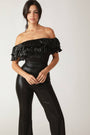 A Coated Black Jumpsuit FLYING TOMATO