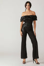 A Coated Black Jumpsuit FLYING TOMATO