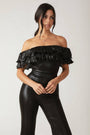 A Coated Black Jumpsuit FLYING TOMATO